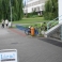 Stojany CITY zamykatelné s informační cedulí na sloupku u plaveckého stadionu